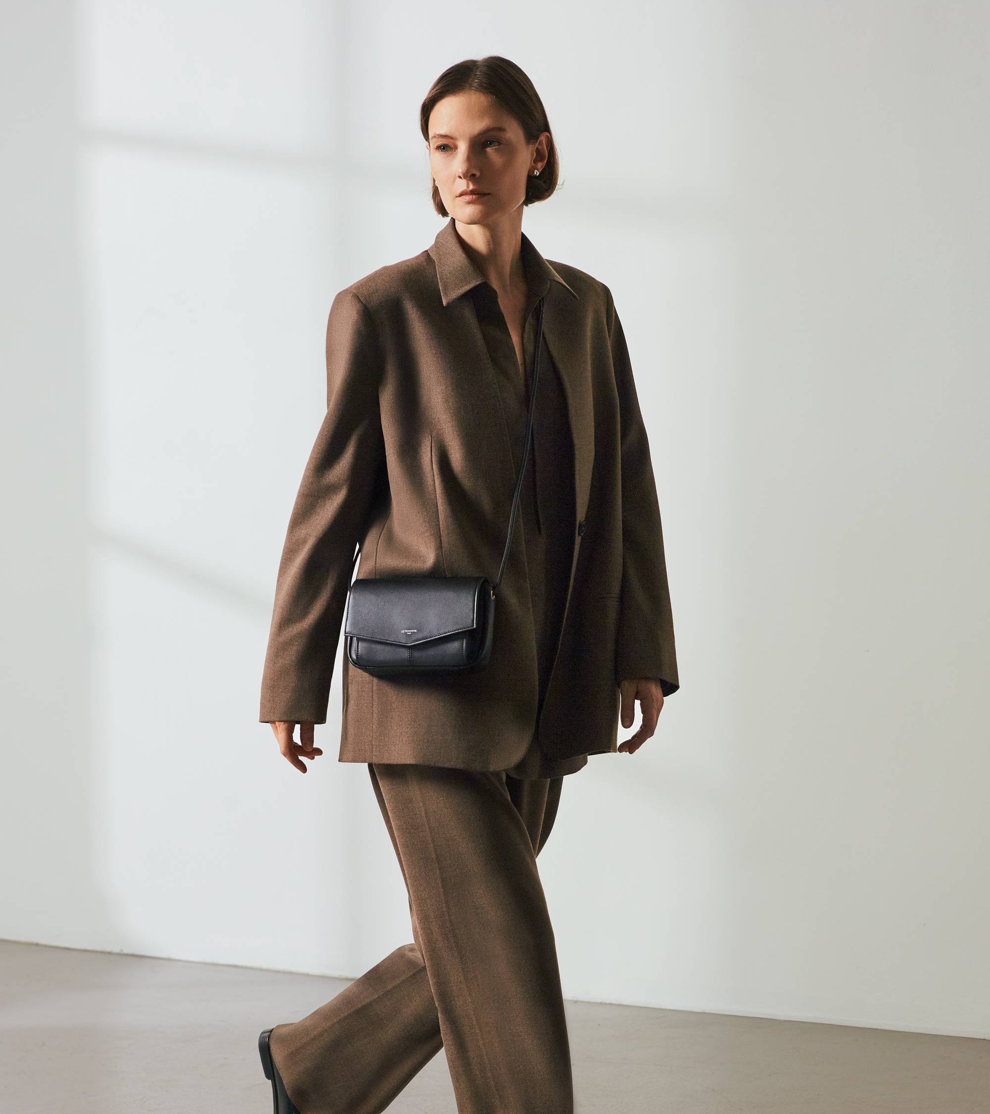 Charlotte smooth leather clutch bag with removable shoulder strap